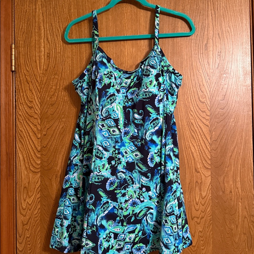 20 W, swim dress by Fit 4 U. Like new. D cup.
Modest, comfortable. Worn once.